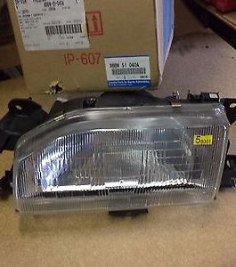 n°ma201 phare gauche mazda 323 8bbw51040a neuf endommagé DPA86