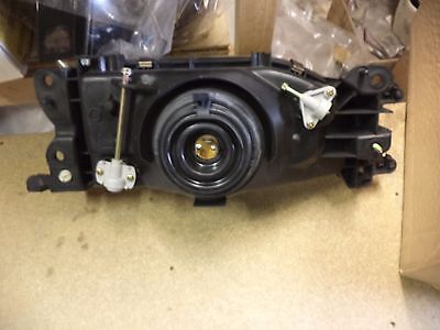 n°ma201 phare gauche mazda 323 8bbw51040a neuf endommagé DPA86