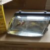 n°he125 phare VW passat B5 gauche 1af007620051 neuf hella DPA86