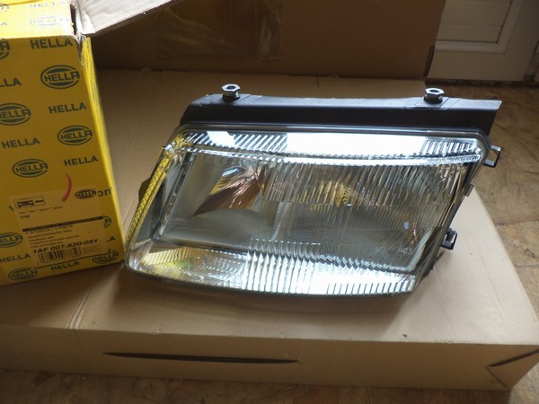 n°he125 phare VW passat B5 gauche 1af007620051 neuf hella DPA86