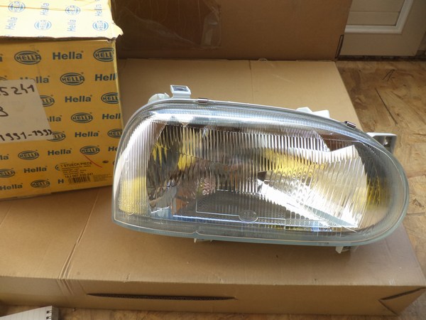 n°he125 phare VW passat B5 gauche 1af007620051 neuf hella DPA86