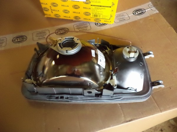 n°he347 phare gauche mercedes NG poids lourd 1eh002658031 hella neuf DPA86