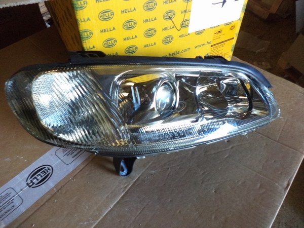 n°he359 feu gauche opel astra H blanc hella 9el160467011 neuf n°he359 feu gauche opel astra H blanc hella 9el160467011 neuf DPA86