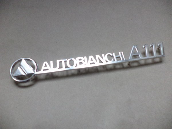 n°da5 insigne coffre alu autobianchi A111 neuf NOS DPA86